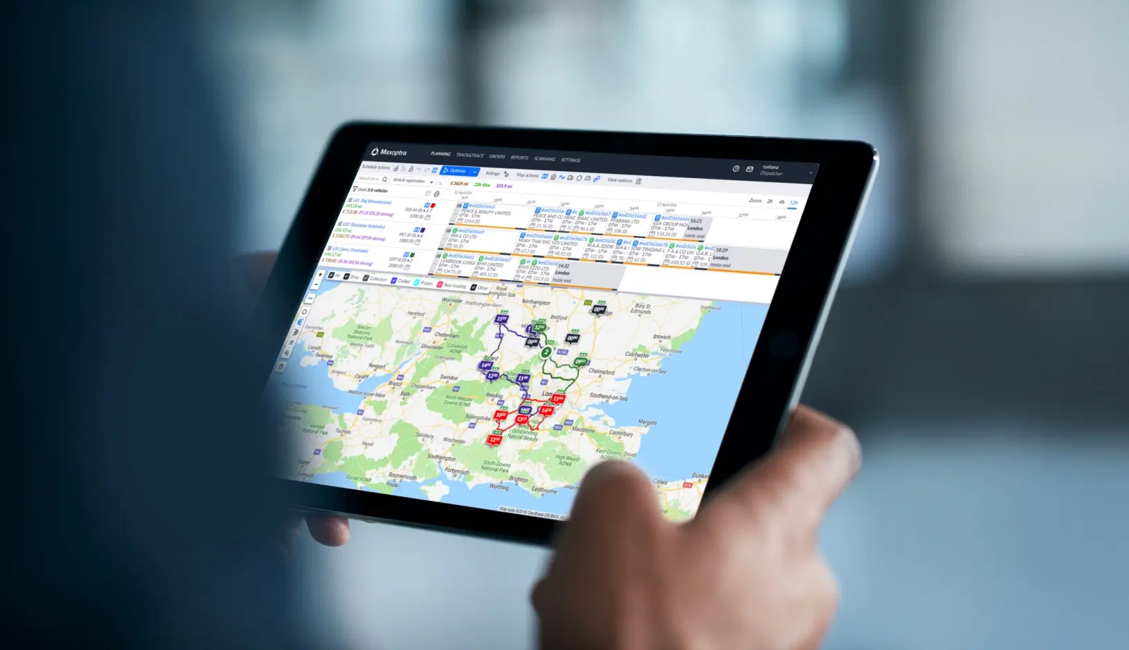 Person using MaxOptra route optimisation on their mobile device