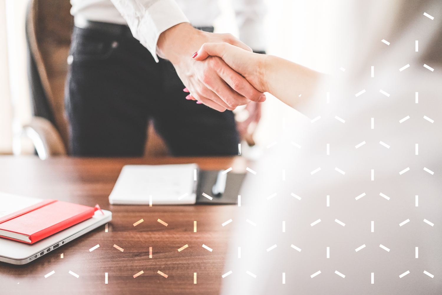 man and woman shaking hands