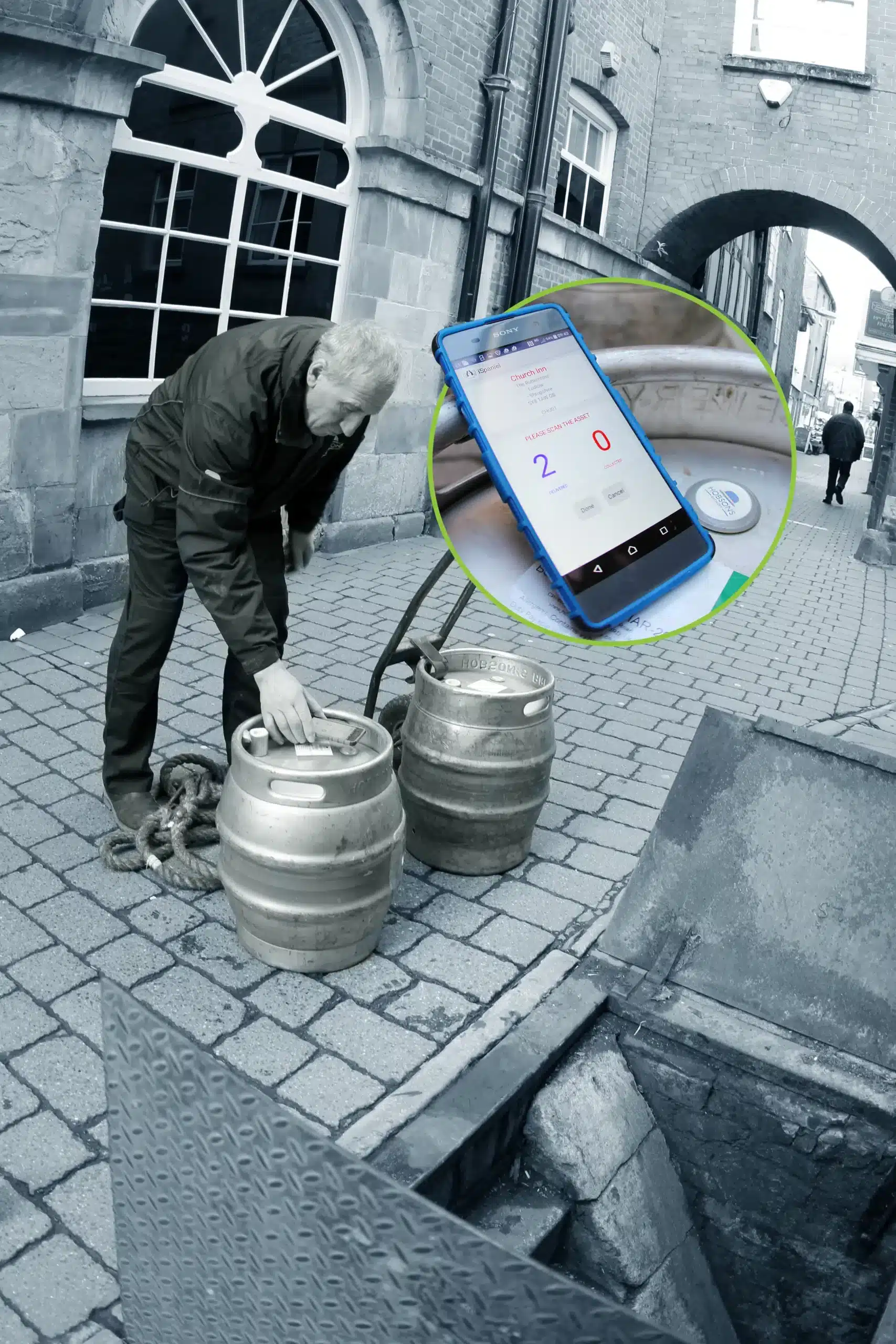 A man scans a label on a beer keg using a smartphone, with a cutout showing an app on the smartphone screen