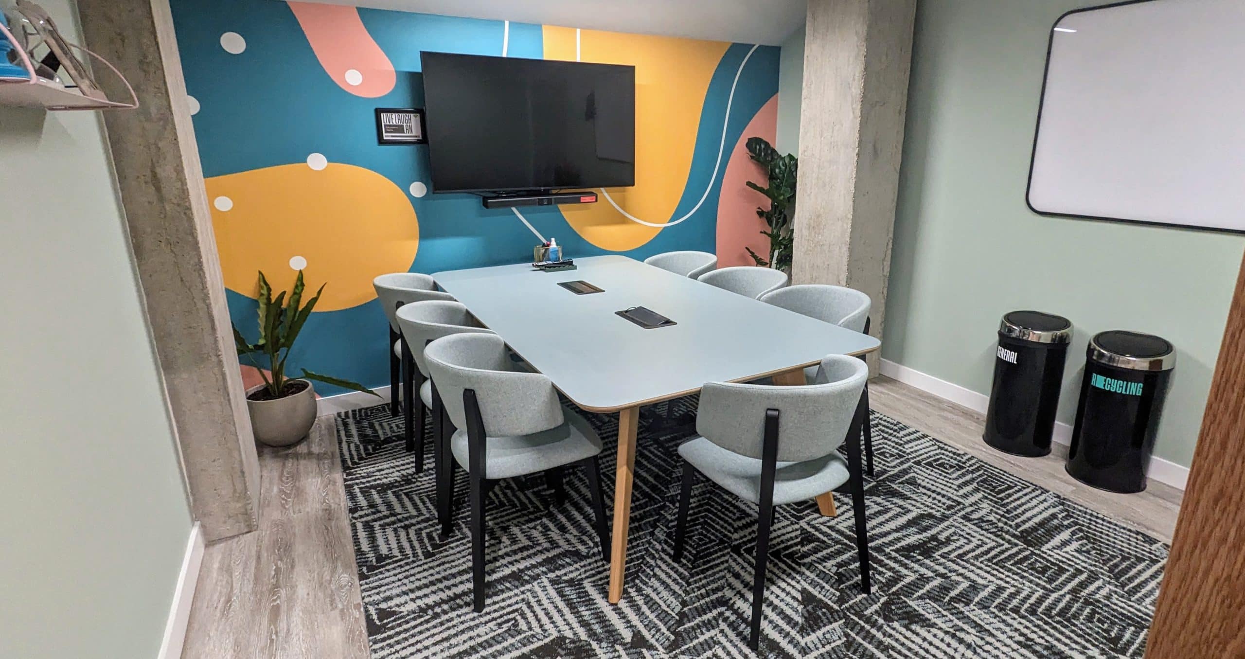 Image of a meeting room with brightly coloured walls