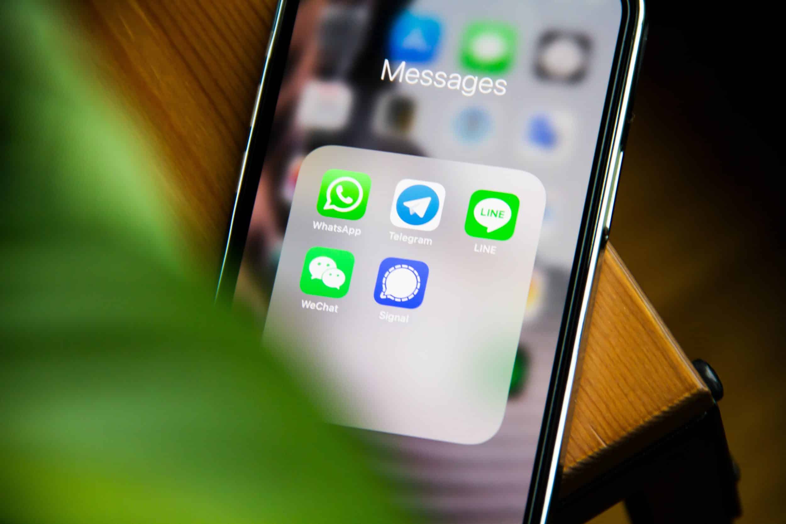 Close up of iphone with messaging apps open