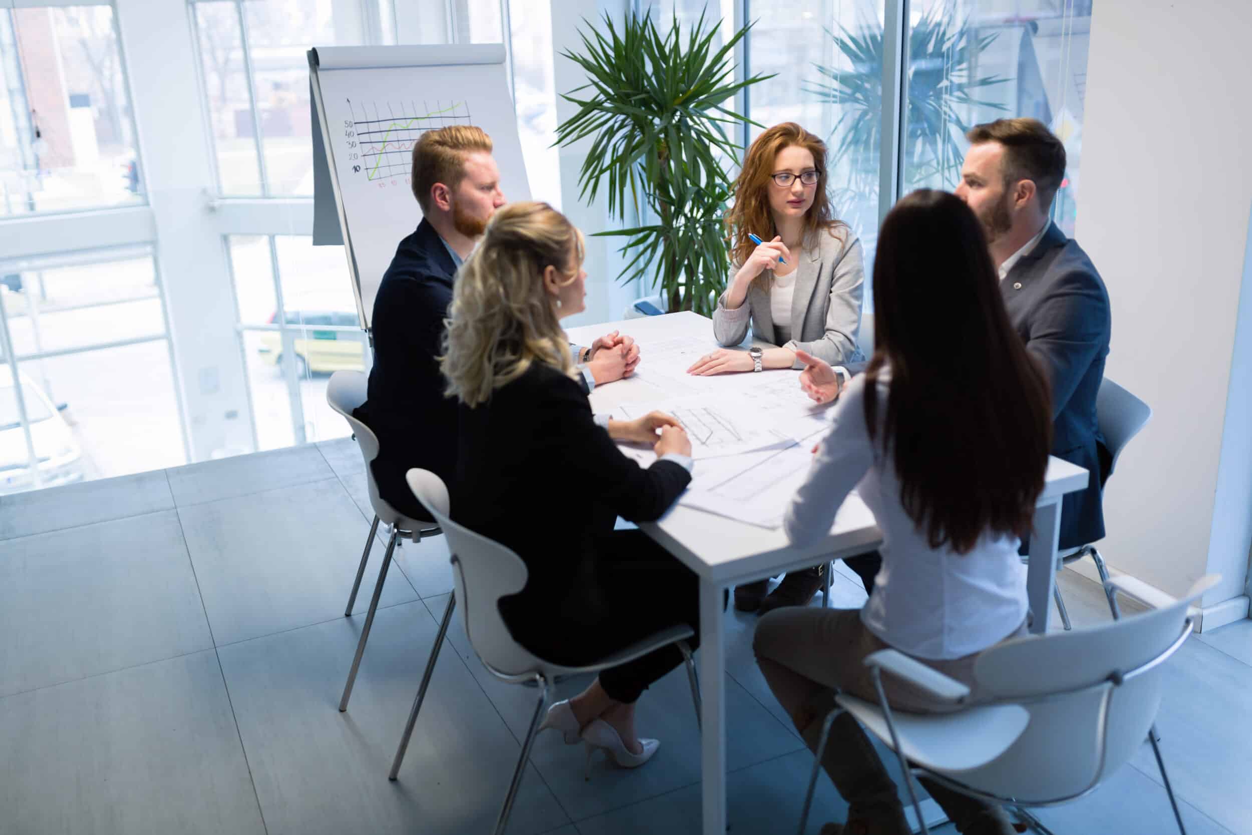 Business meeting in an office - to determine KPIs and metrics to measure route optimisation