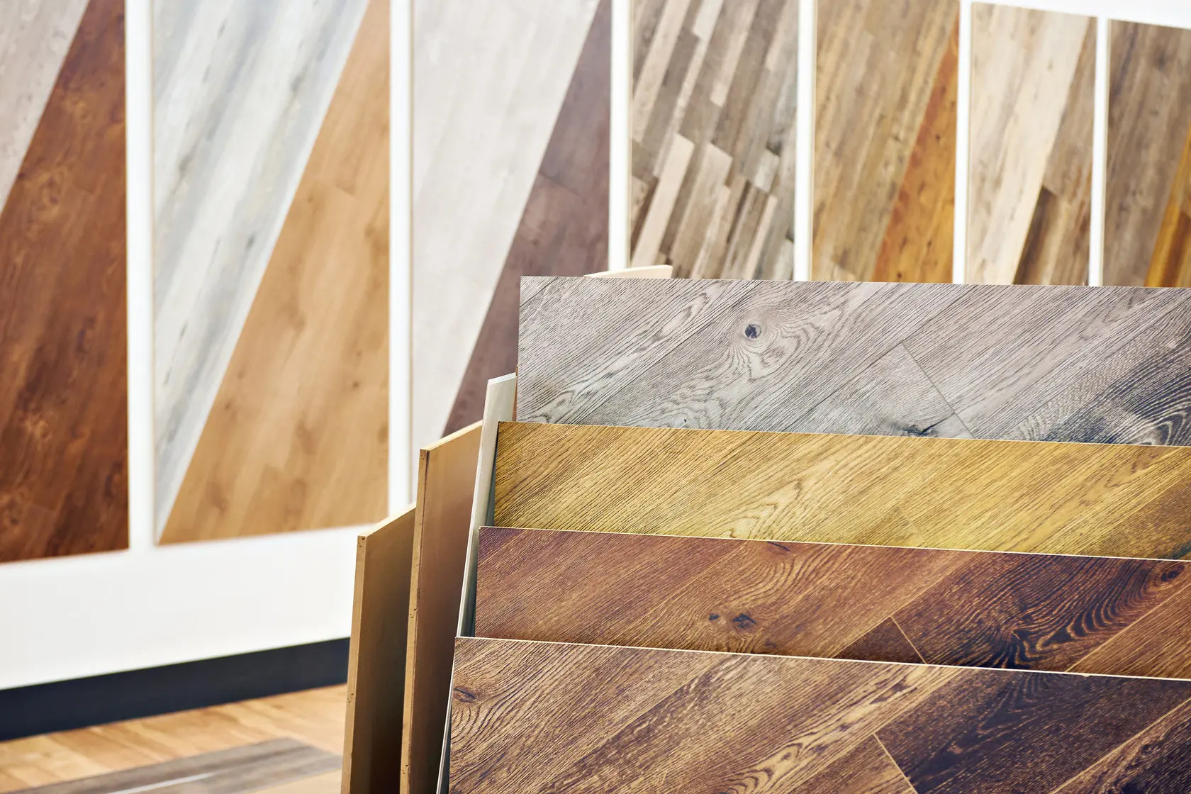 A display of different wooden flooring samples.