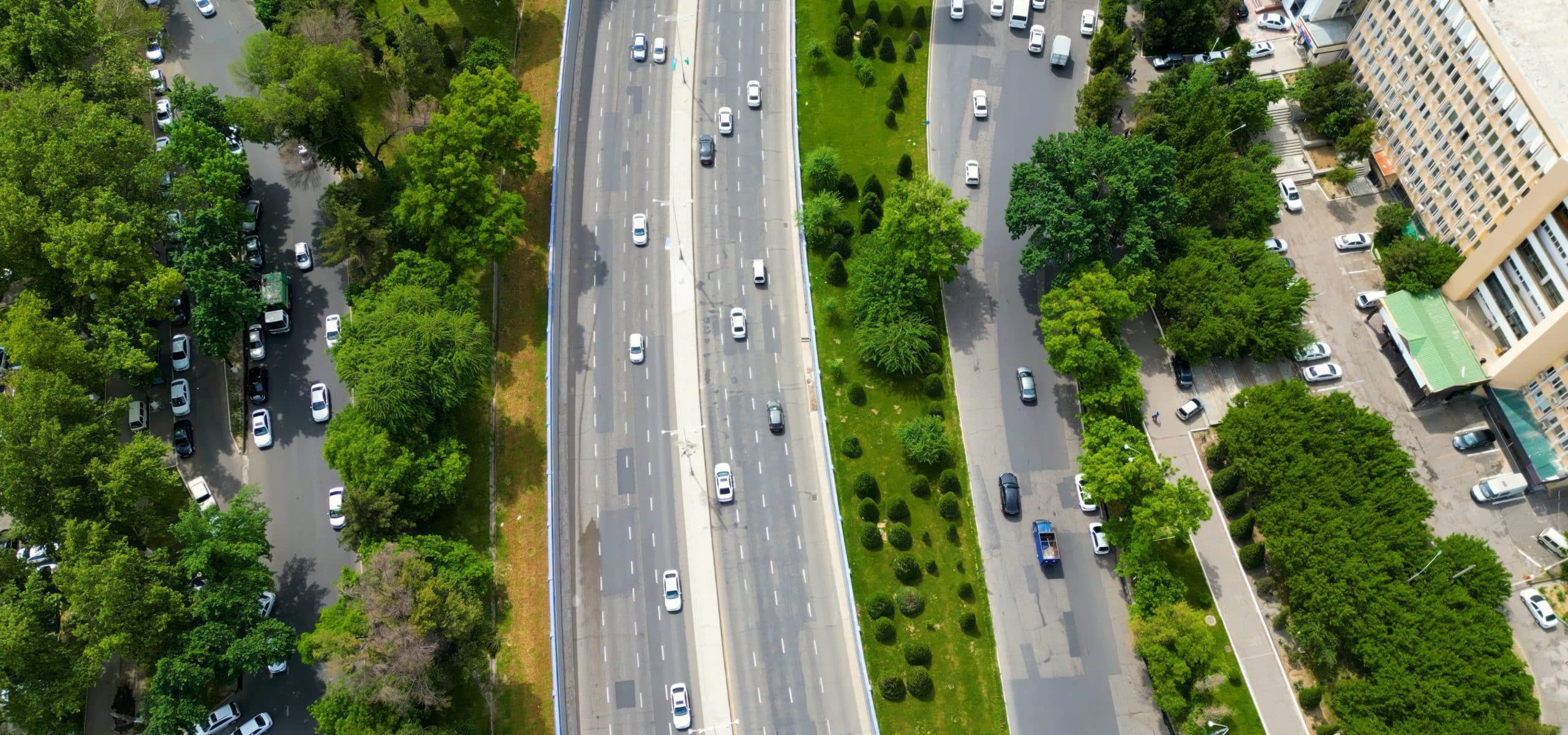Top down aerial view of roads with cars